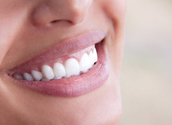 close shot of woman's smile