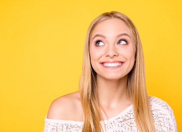 A young woman smiling