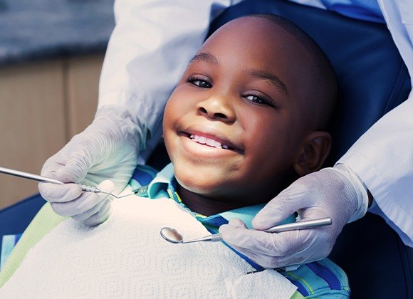 little boy smiling