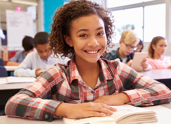 girl smiling at school