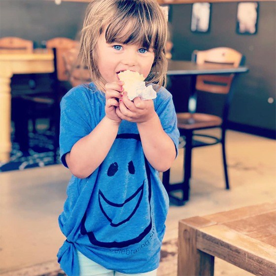 little girl eating treats