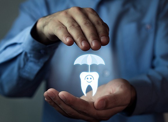 man holding cartoon tooth