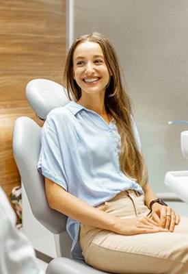 Woman and dentist taking in the treatment room