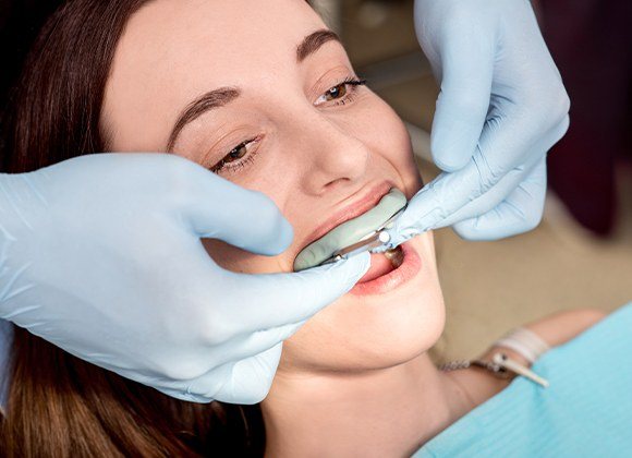 woman getting fluoride treatment