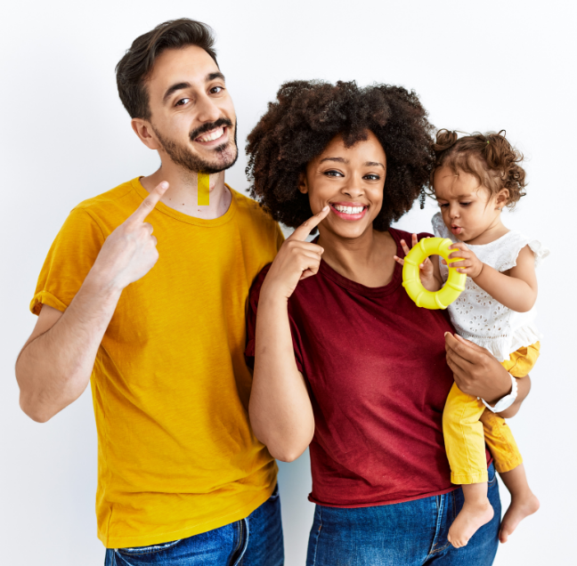 Family smiling and pointing to their teeth
